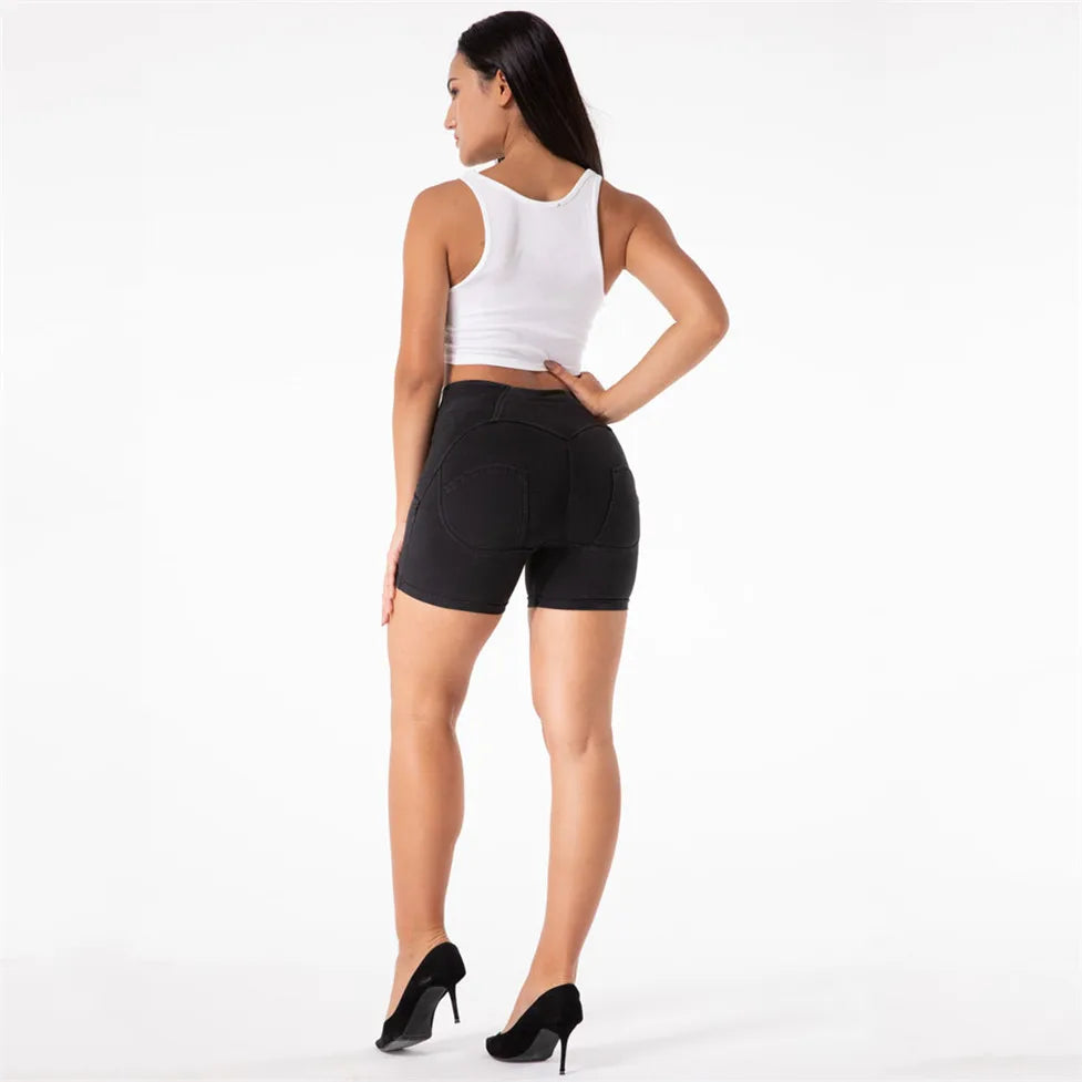 Experience the perfect blend of style and comfort with our High Waisted Black Denim Shorts. The 4 way stretch fabric provides a flattering fit that lifts and shapes your curves. The high rise waist and zipper front add a modern touch to these super cute shorts. Elevate your summer wardrobe today!