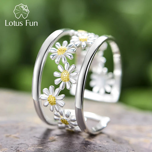 Indulge in the delicate beauty of our Elegant Little Daisy Flower Adjustable Rings. Made with real sterling silver, these rings feature a charming daisy flower design that is both elegant and adjustable. Elevate any outfit with this versatile and timeless piece. Passionately crafted for the modern woman.