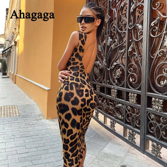 Get ready to turn heads with our Sexy Leopard Print Tank Backless Mid Length Bodycon Dress! The eye-catching leopard print is sure to make a statement, while the backless design adds an alluring touch. Perfect for a night out, this dress will enhance your figure and boost your confidence.