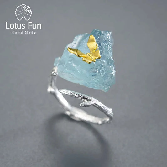 Indulge in the beauty of this Aquamarine Gemstones Butterfly Ring. Made of original sterling silver, its delicate butterfly design is embellished with stunning aquamarine gemstones. Experience elegance and grace with every wear, adding a touch of enchantment to your style. A must-have for any jewelry collection.