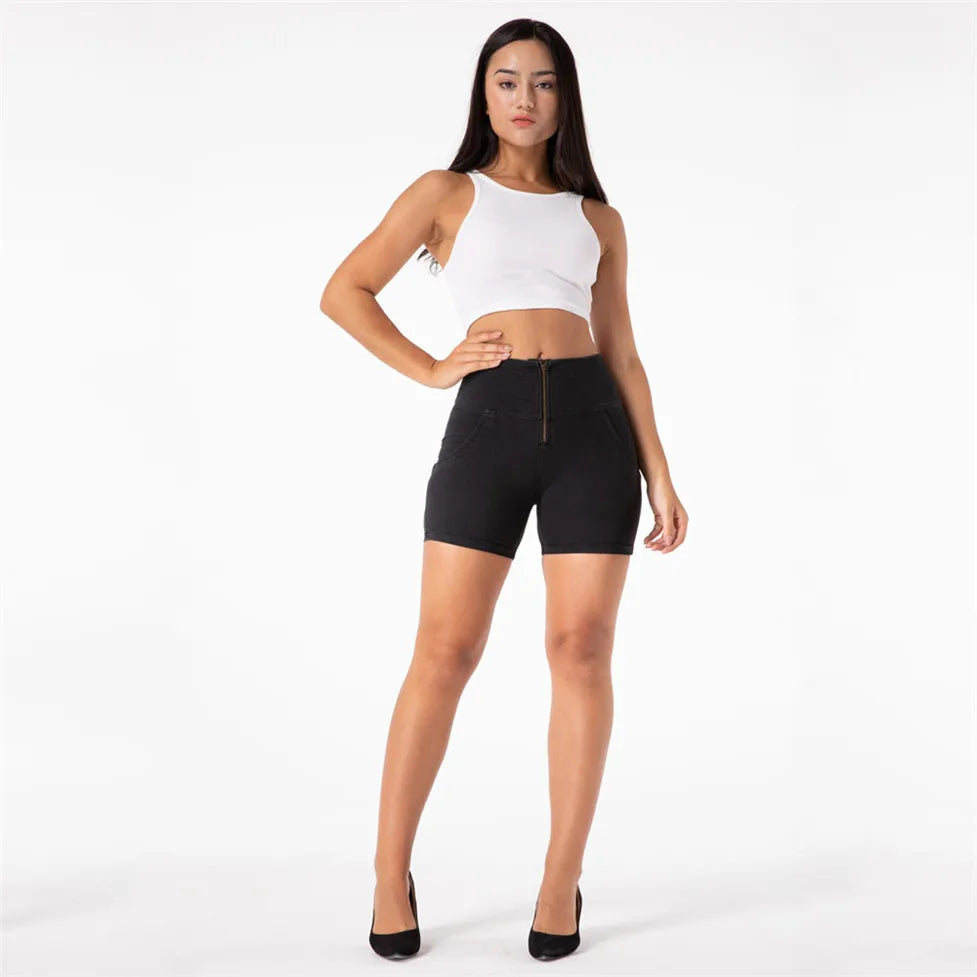 Experience the perfect blend of style and comfort with our High Waisted Black Denim Shorts. The 4 way stretch fabric provides a flattering fit that lifts and shapes your curves. The high rise waist and zipper front add a modern touch to these super cute shorts. Elevate your summer wardrobe today!