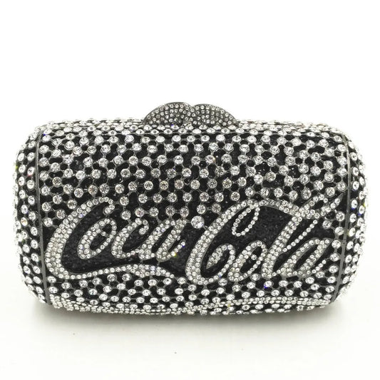 Introducing the epitome of glamour and nostalgia: the Rhinestone Coca-Cola Clutch Purses by Thread Harbor. These stunning accessories are a tribute to the iconic beverage and are designed to make a sparkling statement wherever you go.