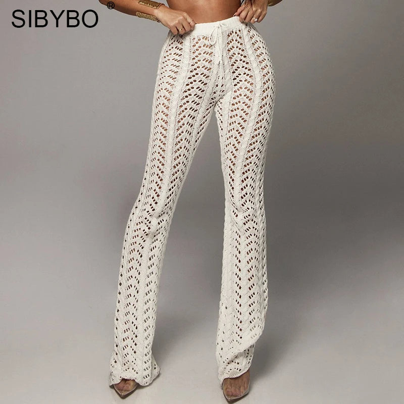 Elevate your style with our Crochet High Waist Knit Wide Leg Cotton Spandex Casual Pants! Available in stunning Tan, Beige and classic Black, these pants are crafted with a flattering high waist and airy wide legs for a super sexy look. Perfect for any occasion, these pants are a must-have for the fashion-forward.