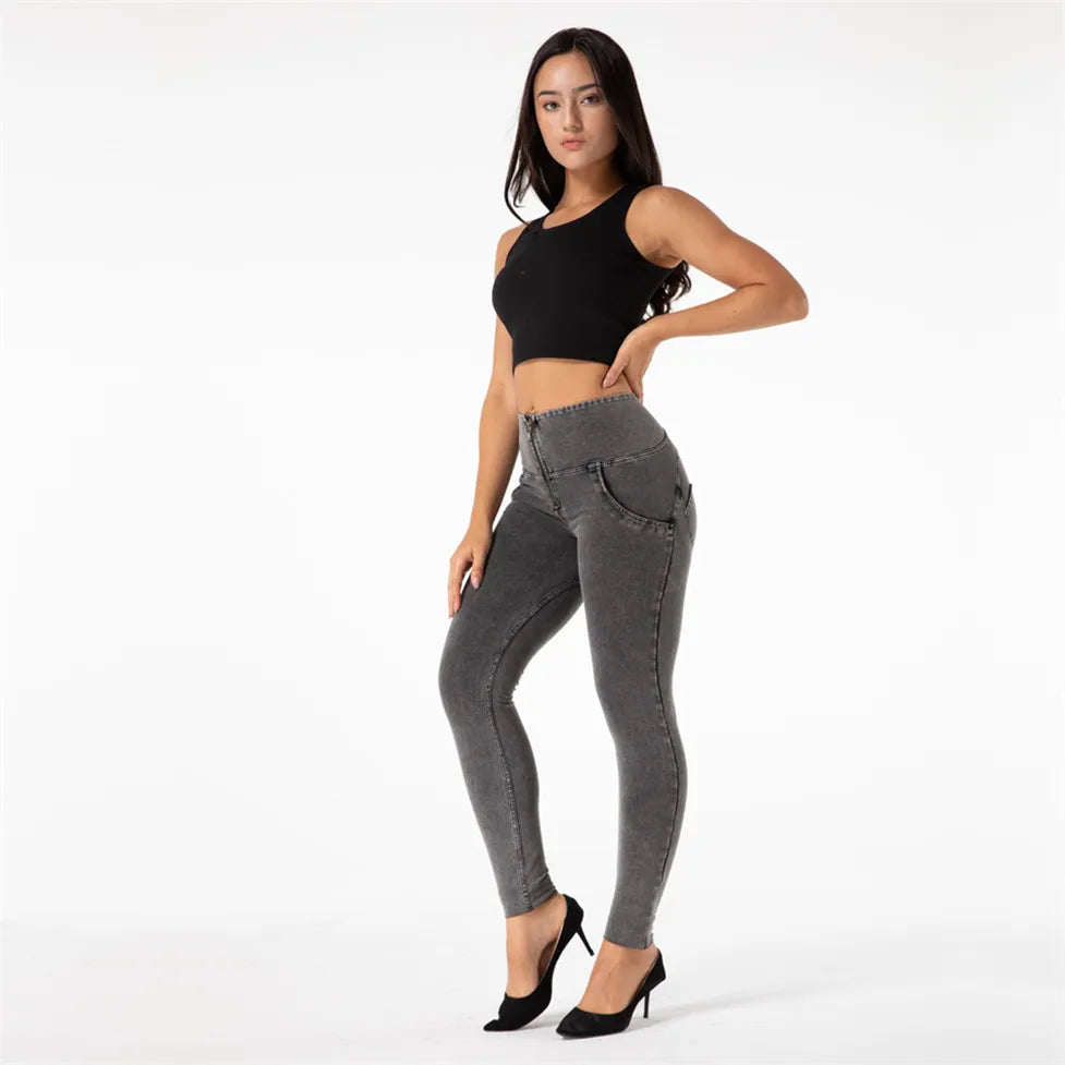 Enhance your curves with our High Rise Stretch Skinny Jeans. Made with butt lift technology and a 4-way stretch fabric, these gray jeggings will hug your body in all the right places for a sexy and flattering fit. Elevate your fashion game with these stylish and comfortable gray denim skinny jeans.