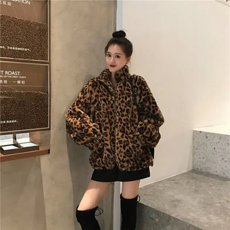 Unleash your wild side with our Faux Fur Leopard Print Jacket! Featuring a trendy collar, zipper closure, and functional pockets, this cozy coat will keep you warm and stylish. Turn heads and make a statement with this must-have piece.