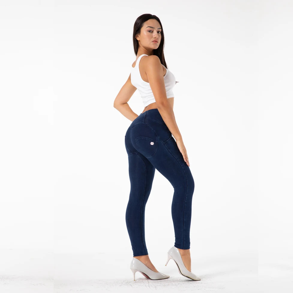 Experience the ultimate in comfort and style with our Dark Blue Stretch Skinny Jeans. Crafted from a stretch denim spandex fabric, these jeans effortlessly hug your curves and provide a flattering skinny leg silhouette. The innovative butt lift technology enhances your natural curves, making you look and feel confident. Elevate your wardrobe with these high waist pull on jeans.