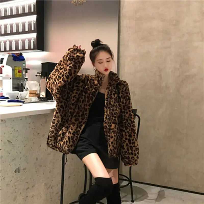 Unleash your wild side with our Faux Fur Leopard Print Jacket! Featuring a trendy collar, zipper closure, and functional pockets, this cozy coat will keep you warm and stylish. Turn heads and make a statement with this must-have piece.