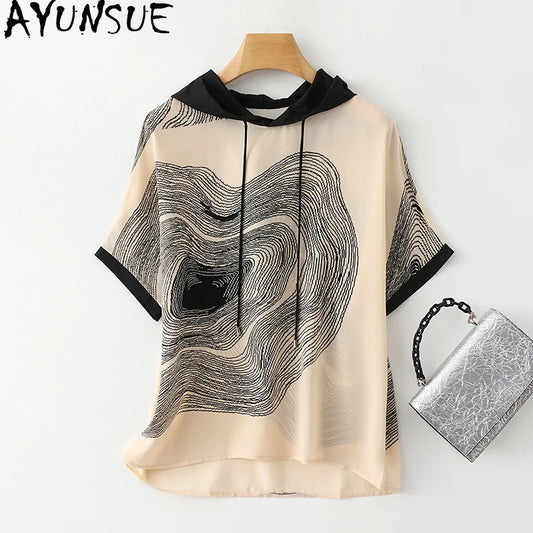 Elevate your wardrobe with our luxurious Mulberry Silk Hooded Short Sleeved Top. Made with the finest silk, this top features a unique geometric design in either beige and black or solid black. The hood adds a trendy touch while the short sleeves make it perfect for any season. Indulge in style and comfort with this must-have top!