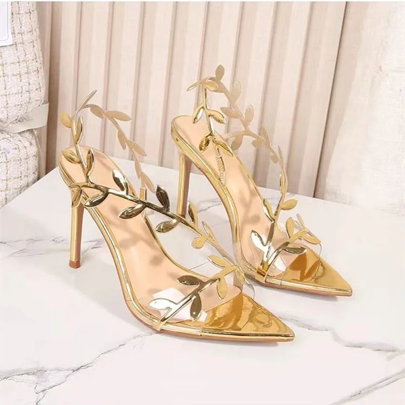 These shoes are so elegant.  the sole of the shoe is gold.  there is a gold branch with gold leaf's that wraps across the toes and up across the top of the foot and up and across the heel.  