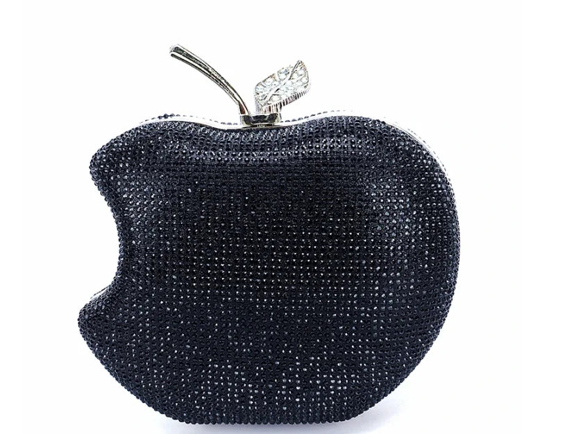    Get ready to shine with our Rhinestone Apple Novelty Clutch with Chain! The stunning rhinestone design adds a touch of glamour and the detachable chain allows for versatility in wearing. Perfect for a fun night out or a special occasion, this clutch is guaranteed to make a statement and turn heads!