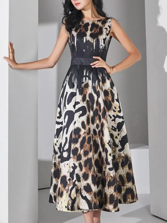 Unleash your wild side with our Beautiful Sleeveless A-Line Leopard Print Dress! The belted waist and full, mid-length skirt will accentuate your curves and make you feel confident and stylish. Perfect for any occasion, this dress is a must-have for those who want to make a statement with their fashion choices!