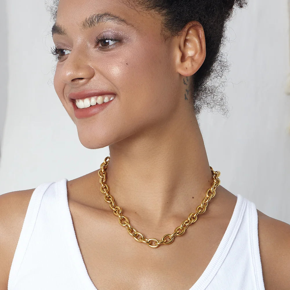 Level up your accessory game with this Chunky Gold Link Chain Necklace. Crafted from high quality stainless steel, this necklace is both durable and stylish. Add a touch of glamour to any outfit with its bold and chunky design. Elevate your style with this statement piece!