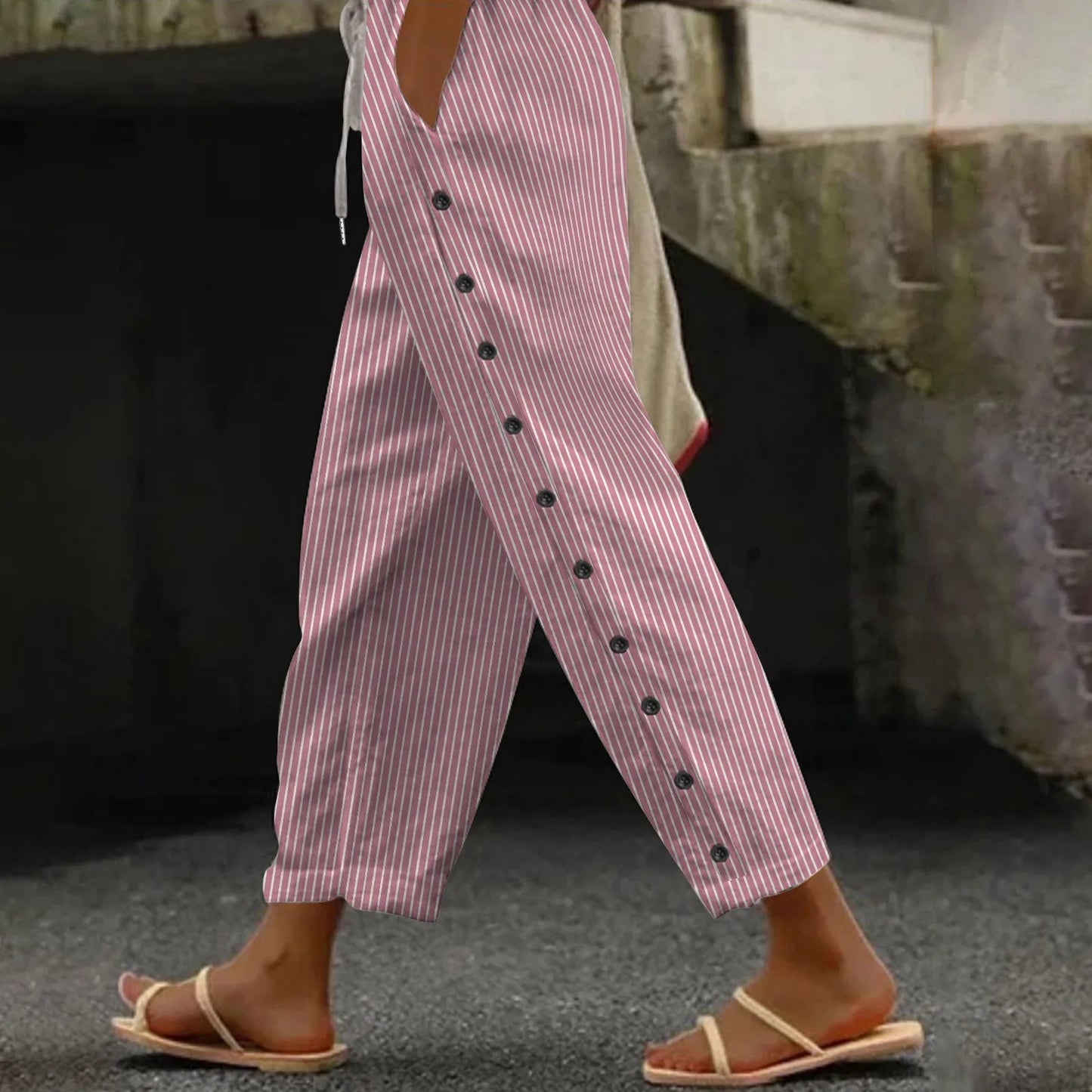 Upgrade your summer wardrobe with our Summer Side Buttons Casual Trousers. Made of high-quality cotton linen, these harem pants are both stylish and comfortable. The side buttons add a unique touch to the loose and airy design. Perfect for casual outings and lounging at home, these pants will elevate your summer style game.