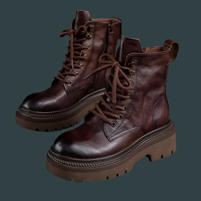 Experience the perfect combination of style and comfort with our Women's Leather Combat Boots. Made with high-quality leather, these boots come in a stunning brown and black color and feature lace-up detailing for a touch of edginess. Conquer any terrain with ease and stand out in these must-have boots.