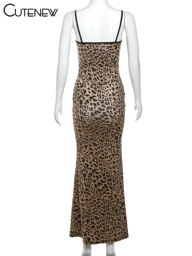 Embody the wild beauty of a leopard with our Sexy Leopard Print Maxi Dress. The low neckline and backless design will make you feel confident, while the front tie adds a touch of elegance. Perfect for a night out or a special occasion, this dress will make you stand out in any crowd!