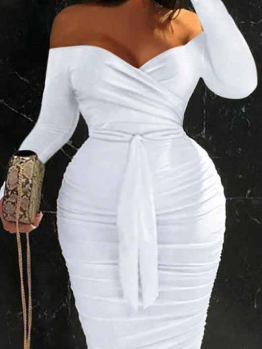 This stunning white long sleeve off shoulder plus size bodycon dress is a must-have for any fashion-forward woman. The fitted silhouette accentuates curves while the off shoulder neckline adds a touch of elegance. Perfect for any occasion, this dress is guaranteed to make you feel confident and beautiful!