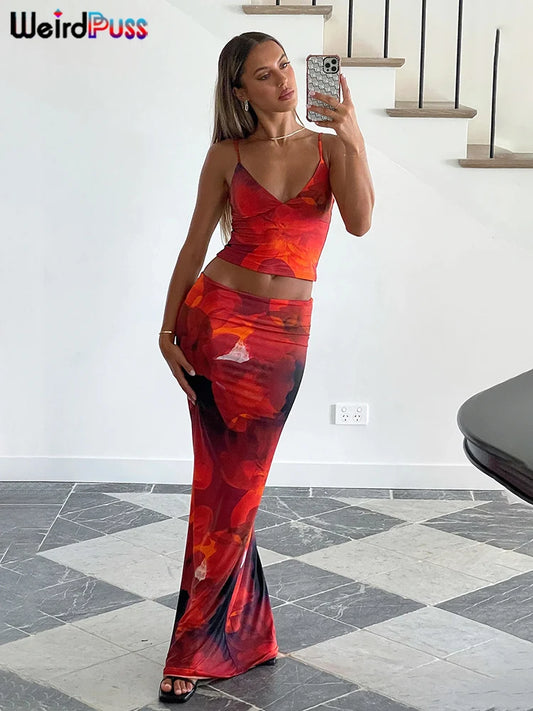 Get ready to turn heads and make a statement in our Deep Orange and Red Color Super Hot Tie Dye Maxi Summer Bodycon Skirt and Top set! The vibrant colors and unique tie dye design add a touch of fun and excitement to your summer wardrobe. Show off your figure in this bodycon skirt and top set, perfect for any day or night occasion.