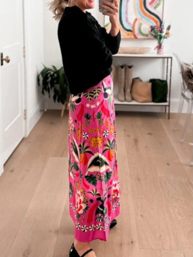 Introducing our Pink Tropical Floral Mid Length Skirt! Embrace the vibrant colors and lively patterns of this must-have piece. Lightweight and comfortable, it's perfect for any summer day. Stand out in style and feel confident with this unique skirt. Elevate your wardrobe and enjoy the benefits of a bold and versatile look!