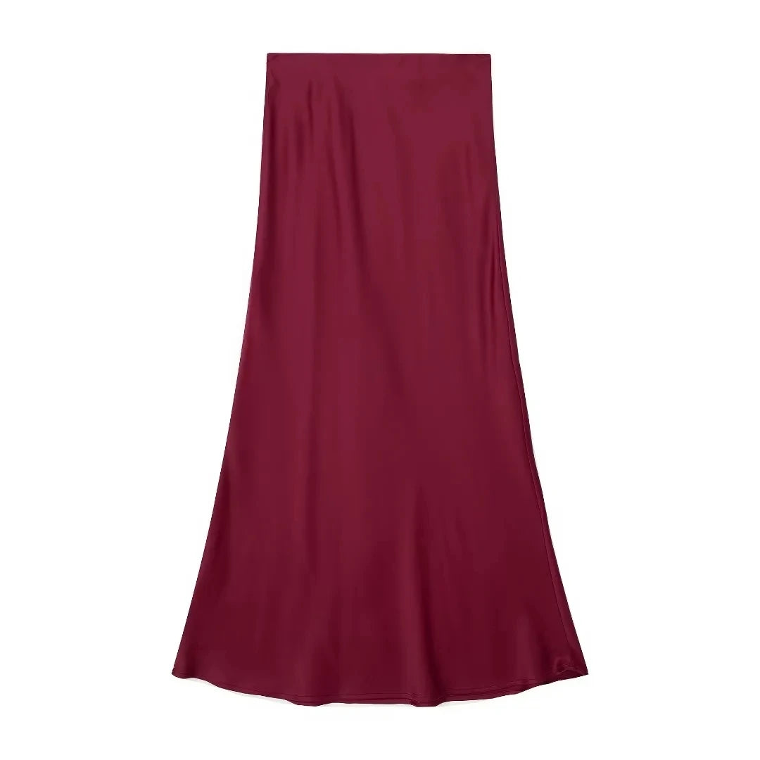 Get ready to elevate your style with our Women's Elastic Waist Mid Length Casual Satin Skirt! Made from high-quality satin, this skirt offers a comfortable and flattering fit with its elastic waistband. Perfect for any casual occasion, it's a must-have addition to your wardrobe.