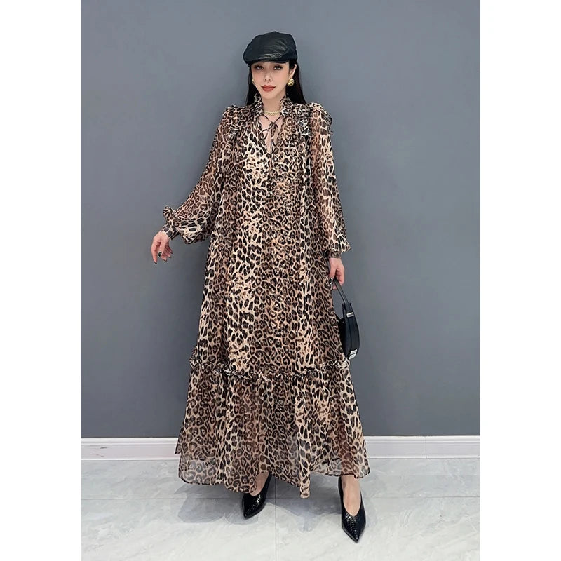 Indulge in fierce and feminine style with our Chiffon Leopard Print A Line Dress! The long, full ruffle edge sleeves with elastic wrist provide a chic and comfortable fit, while the spliced skirt adds a touch of drama. Embrace your wild side and turn heads with this statement-making dress.