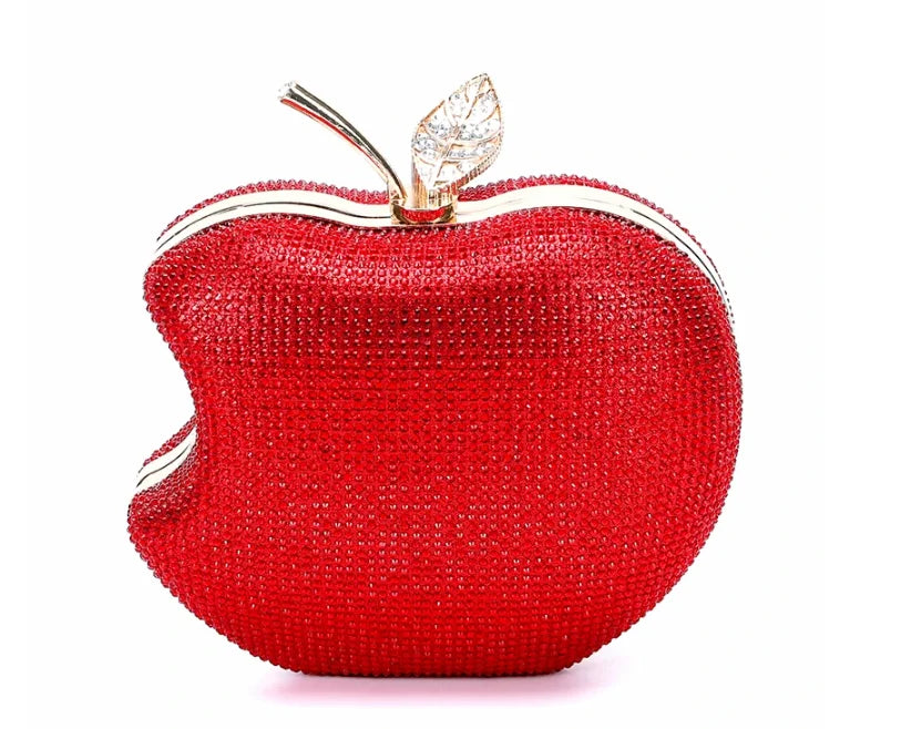    Get ready to shine with our Rhinestone Apple Novelty Clutch with Chain! The stunning rhinestone design adds a touch of glamour and the detachable chain allows for versatility in wearing. Perfect for a fun night out or a special occasion, this clutch is guaranteed to make a statement and turn heads!