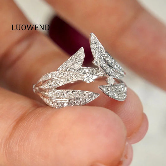 Elevate your style with our stunning 18K White Gold and Diamond Leaf Floral Design Statement Ring. Crafted with fine attention to detail, this ring features a delicate leaf and floral design set in luxurious white gold. The shimmering diamonds add a touch of elegance and sophistication, making it the perfect statement piece for any occasion