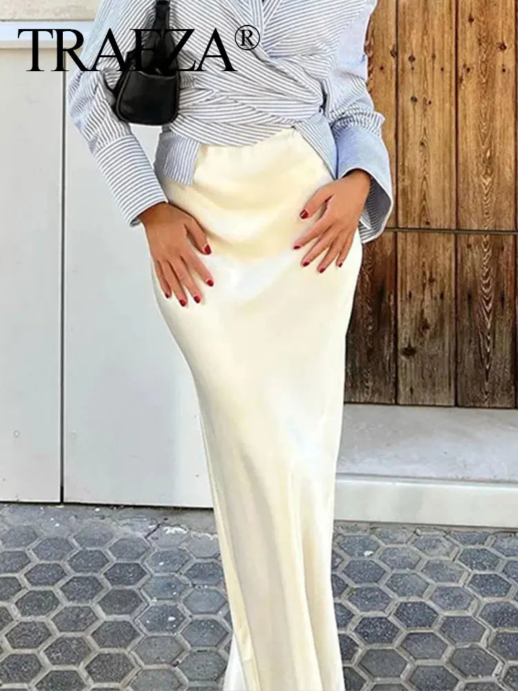 Get ready to elevate your style with our Women's Elastic Waist Mid Length Casual Satin Skirt! Made from high-quality satin, this skirt offers a comfortable and flattering fit with its elastic waistband. Perfect for any casual occasion, it's a must-have addition to your wardrobe.