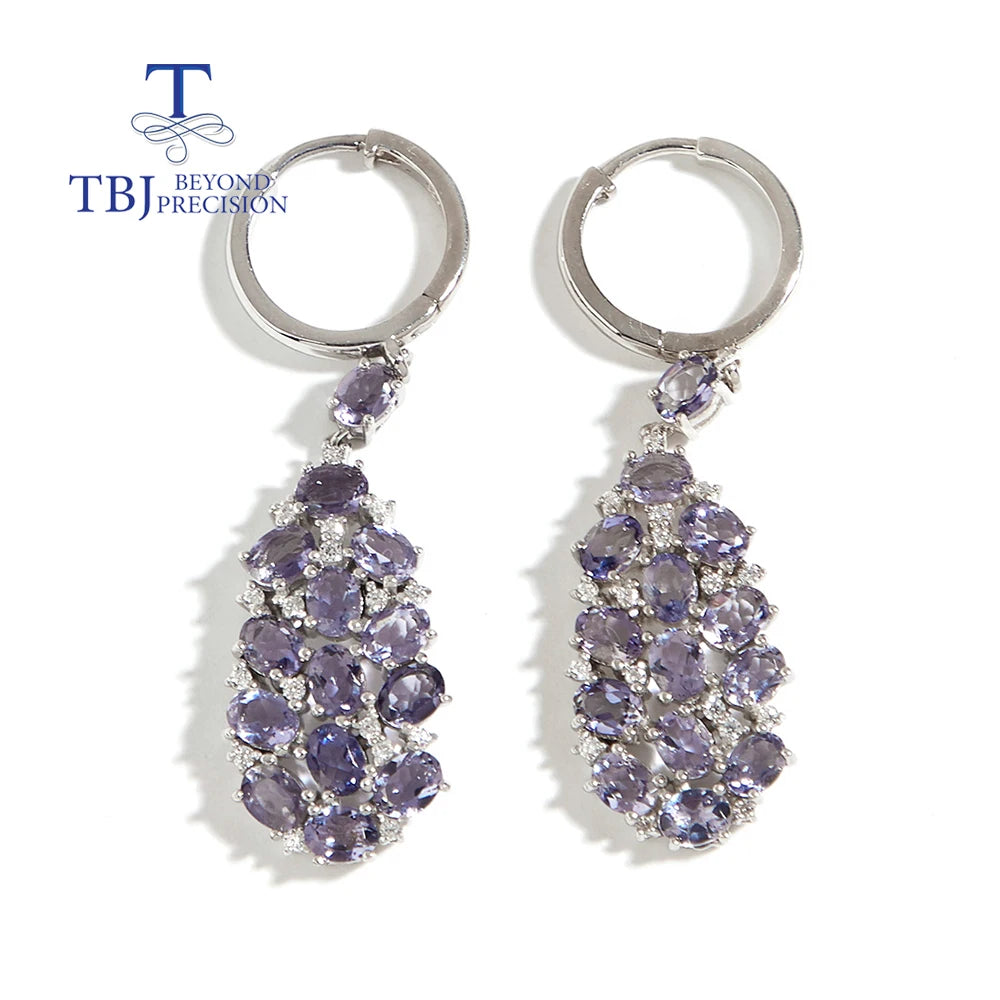 Elevate your look with our exquisite lavender-colored drop earrings, adorned with natural Iolite gemstones. Crafted with precision and attention to detail, these elegant earrings exude a sense of sophistication and luxury.