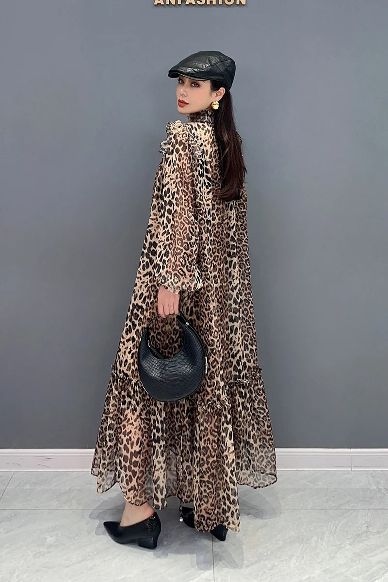 Indulge in fierce and feminine style with our Chiffon Leopard Print A Line Dress! The long, full ruffle edge sleeves with elastic wrist provide a chic and comfortable fit, while the spliced skirt adds a touch of drama. Embrace your wild side and turn heads with this statement-making dress.