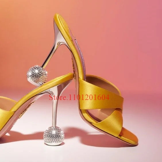 Elevate your style and make a statement with our Disco Ball Slingback High Heels Crystal Ball Heels. Featuring a glittering disco ball design and a comfortable slingback strap, these heels will add a touch of glitz and glamour to any outfit. Perfect for any special occasion, these heels are sure to turn heads and make you feel confident and stylish. Indulge in luxury and shine bright at your next event with our Crystal Ball Heels!