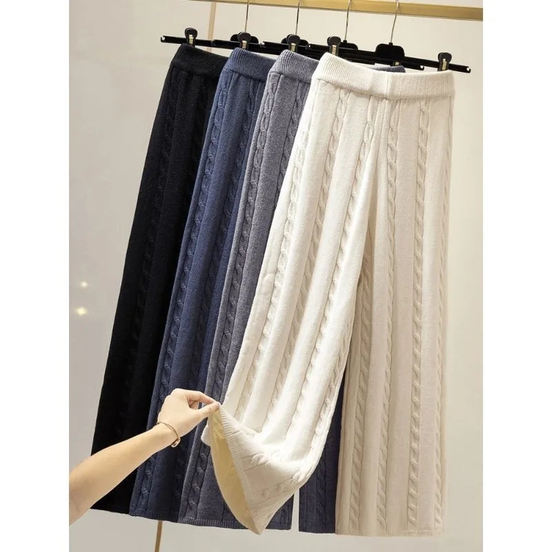 Upgrade your wardrobe with our Cable Knit Wide Leg Pants, featuring an elastic high waist for ultimate comfort and style. Made from a blend of cotton and polyester, these pants offer a perfect fit and solid color design. Perfect for casual wear, these pants are a must-have for every fashionista!