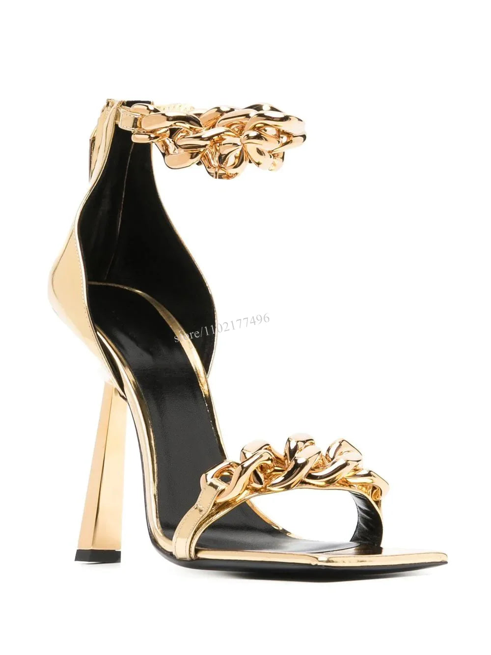 Elevate your style with our Gold Chain Wedge Stiletto Sandal. The sleek design features a buckle strap for a secure fit and a wedge heel adorned with a luxurious gold chain. Make a statement with every step in these exclusive sandals.