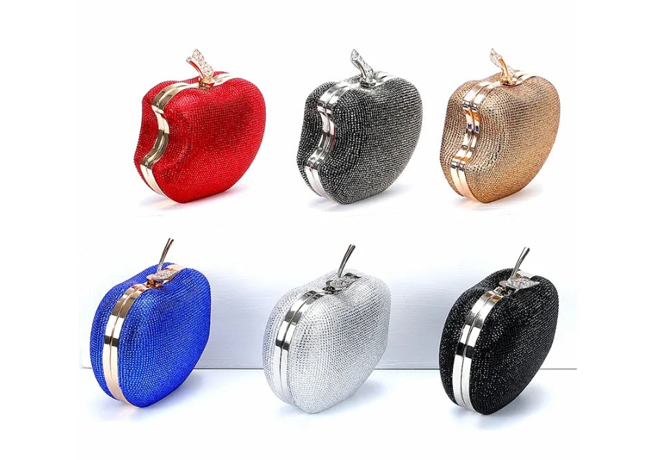    Get ready to shine with our Rhinestone Apple Novelty Clutch with Chain! The stunning rhinestone design adds a touch of glamour and the detachable chain allows for versatility in wearing. Perfect for a fun night out or a special occasion, this clutch is guaranteed to make a statement and turn heads!