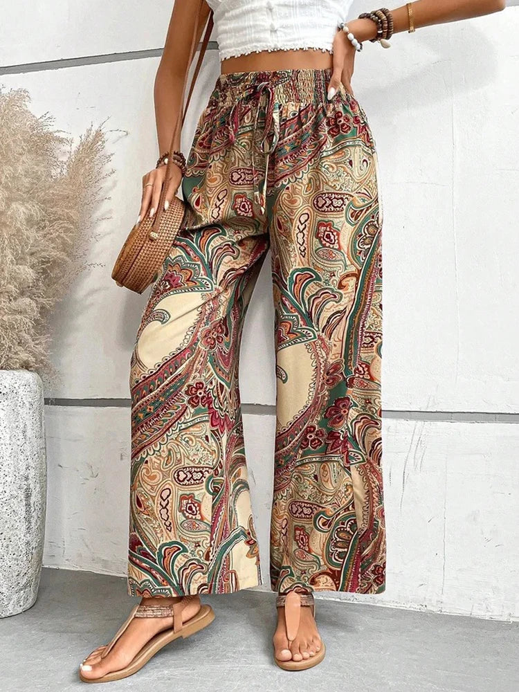 Make a statement with these retro, digital print high waist pants. Not only do they have an elastic waist for maximum comfort, but the wide leg style will give you a boho-chic look. Perfect for any casual occasion, these pants are a fun addition to any wardrobe. Go ahead, flaunt your unique style!