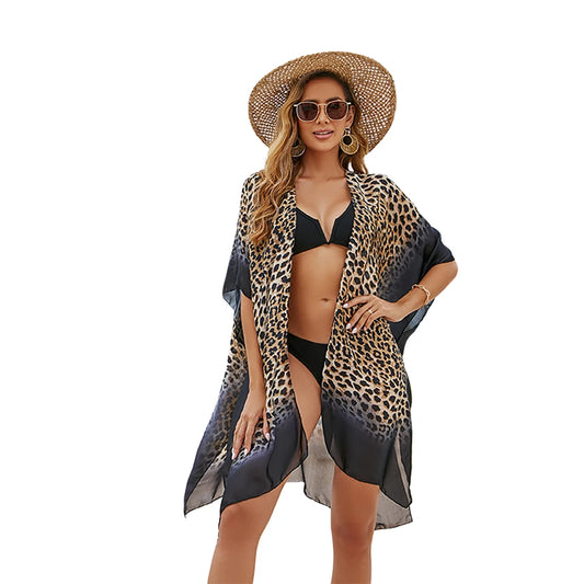 Get ready for a stylish beach day with our Chiffon Sun Protection Shawl Bathing Suit Cover! Made with lightweight chiffon, our cover provides both style and protection from the sun. With 6 beautiful prints to choose from, you'll be the envy of the beach. Stay fashionable and protected with our cover.  Leopard print