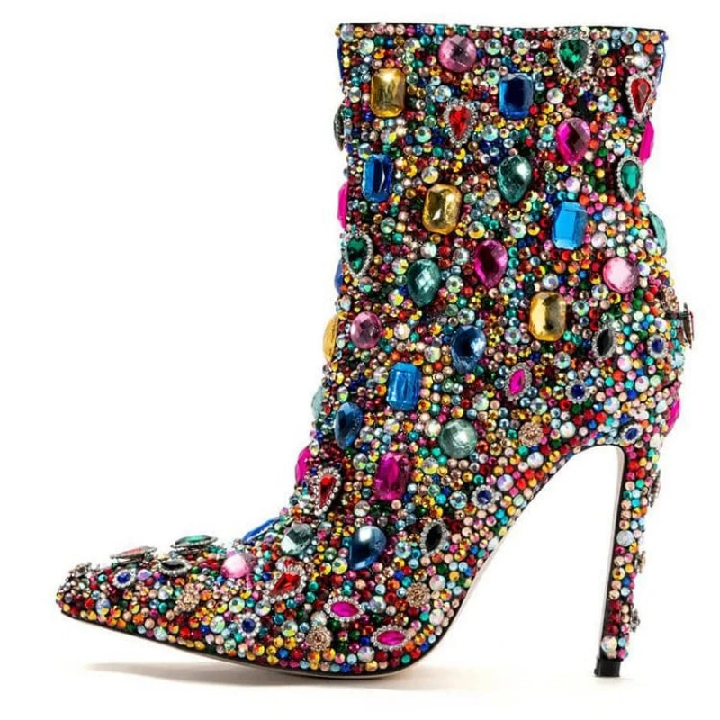 Walk with style in these luxurious Designer Women's Multi Colored Rhinestone Boots. The intricate rhinestone design adds a touch of elegance to any outfit, while the high-quality materials ensure durability and comfort. Elevate your wardrobe with these exclusive boots that are sure to turn heads.