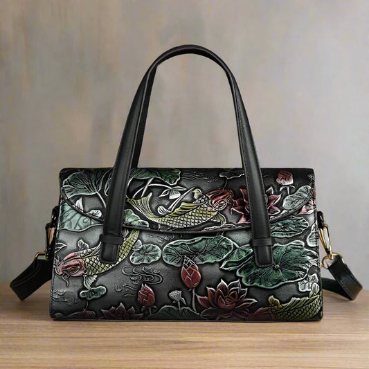 Experience elegance and vintage style with our Genuine Leather Floral Print Women's Crossbody Bag. Made with high-quality leather, this bag features a beautiful floral print design that adds a touch of sophistication to any outfit. Its crossbody design provides convenience and comfort while on the go. Own a timeless piece of fashion today!