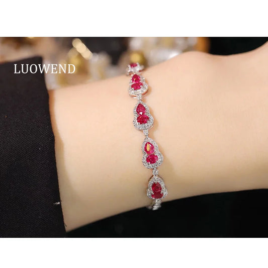 Indulge in elegance with our 18K White Gold Bracelet featuring a stunning Natural Red Ruby Gemstone. Crafted with the finest quality, this bracelet will add a touch of sophistication to any outfit. Feel the luxurious weight of the gold and bask in the vibrant beauty of the ruby. Elevate your style today!