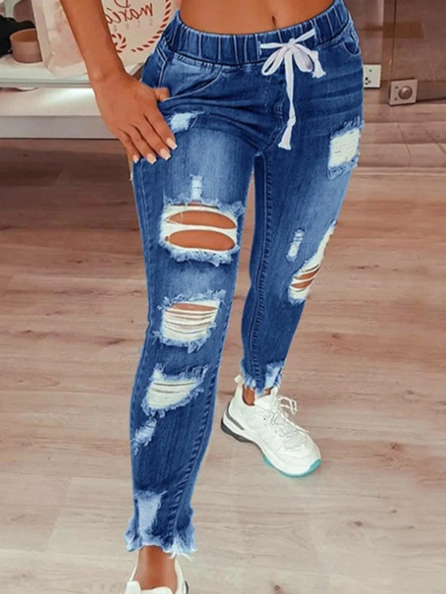 Rock your curves in our Plus Size High-Waist High Stretchy Distressed Denim Jeans! These stylish jeans provide a comfortable fit with their stretchy fabric, while the high-waisted design flatters your figure. The distressed detailing adds an edgy touch to any outfit. Say goodbye to uncomfortable jeans and hello to effortless style!