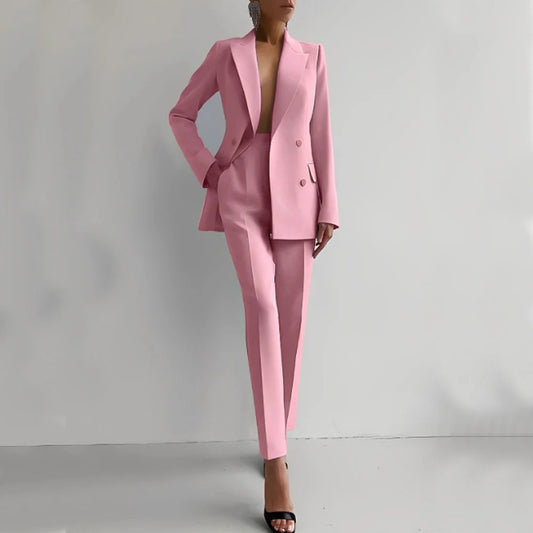 Get ready to slay in this stylish two-piece pantsuit! Featuring a chic pencil trouser and a double breasted lapel blazer, this suit is perfect for any occasion. Look effortlessly put-together and make a statement with this versatile and trendy outfit. Confidence and style guaranteed!