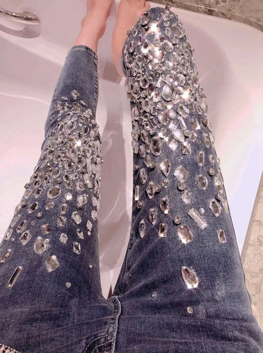 Indulge in these one-of-a-kind Handmade Rhinestone Beaded Denim Skinny Jeans! Handcrafted with intricate rhinestone beadwork, these jeans are sure to make you feel like a star. The perfect combination of luxury and comfort, they will elevate any look and make you stand out from the crowd.