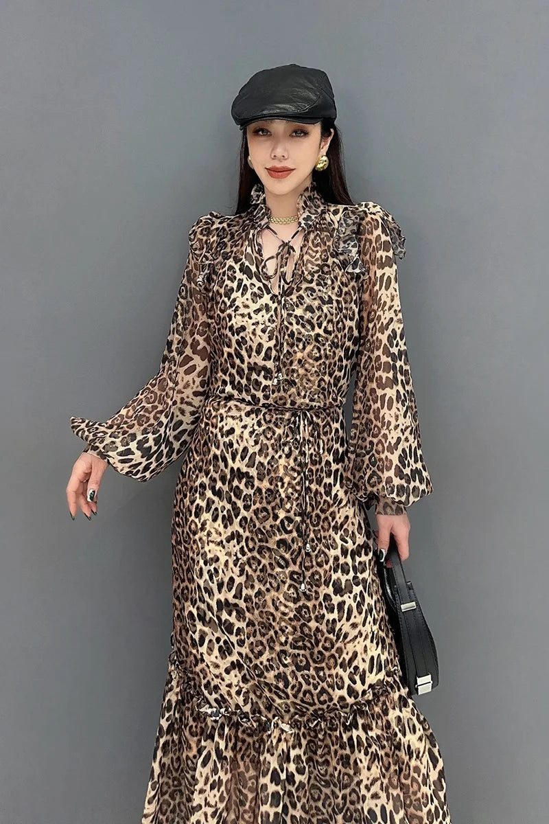 Indulge in fierce and feminine style with our Chiffon Leopard Print A Line Dress! The long, full ruffle edge sleeves with elastic wrist provide a chic and comfortable fit, while the spliced skirt adds a touch of drama. Embrace your wild side and turn heads with this statement-making dress.