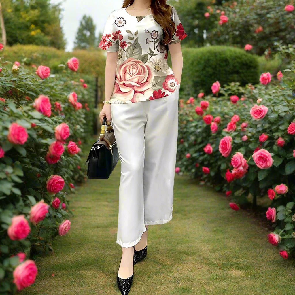 Dusky rose floral design top with white pants