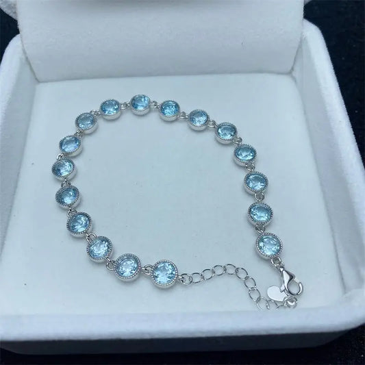 Experience the beauty and elegance of our Sky Blue Topaz Stone Bracelet. Crafted with stunning detail, this bracelet exudes timeless sophistication. Add a touch of color and luxury to any outfit with this must-have accessory. Elevate your style and feel confident with every wear.
