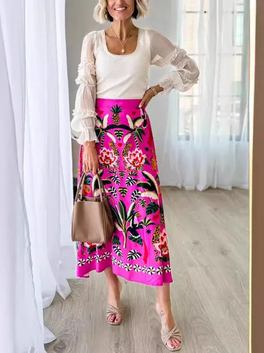 Introducing our Pink Tropical Floral Mid Length Skirt! Embrace the vibrant colors and lively patterns of this must-have piece. Lightweight and comfortable, it's perfect for any summer day. Stand out in style and feel confident with this unique skirt. Elevate your wardrobe and enjoy the benefits of a bold and versatile look!