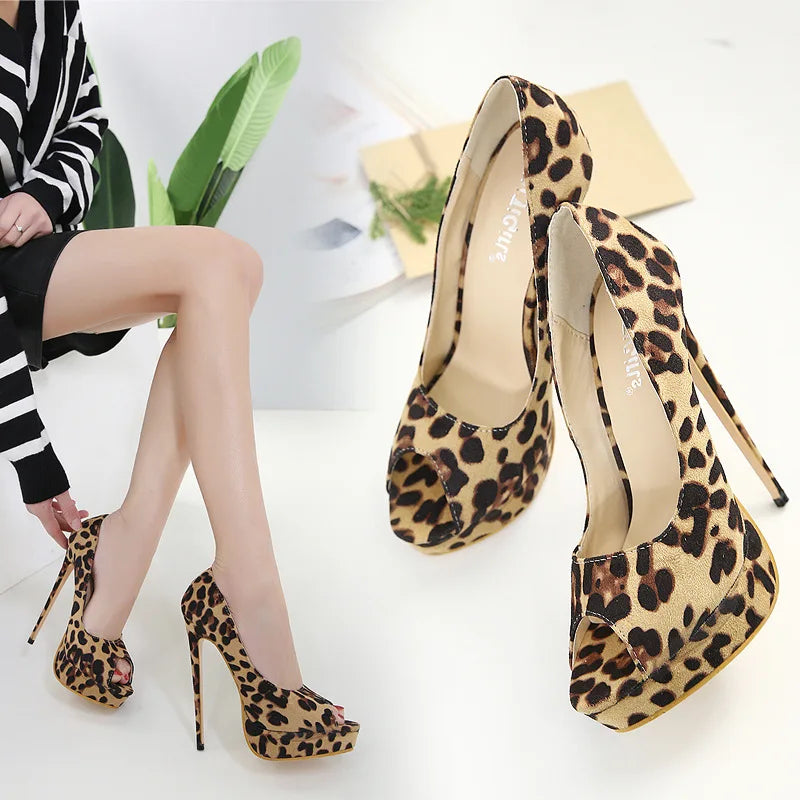 Unleash your wild side with our Leopard Print Open Toe Platform Stiletto High Heels. These fierce heels add a touch of glamour and sexiness to any outfit. Elevate your style with the platform and stiletto design, while the open toe allows for maximum comfort. Make a statement and turn heads wherever you go!