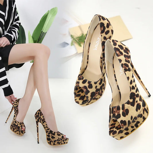 Unleash your wild side with our Leopard Print Open Toe Platform Stiletto High Heels. These fierce heels add a touch of glamour and sexiness to any outfit. Elevate your style with the platform and stiletto design, while the open toe allows for maximum comfort. Make a statement and turn heads wherever you go!