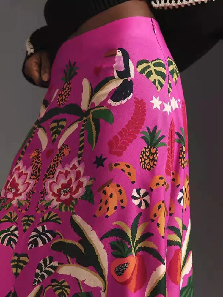 Side zipper.  Introducing our Pink Tropical Floral Mid Length Skirt! Embrace the vibrant colors and lively patterns of this must-have piece. Lightweight and comfortable, it's perfect for any summer day. Stand out in style and feel confident with this unique skirt. Elevate your wardrobe and enjoy the benefits of a bold and versatile look!