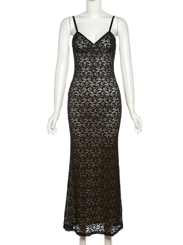 In black.  Embrace your feminine side with our V Neck Spaghetti Strap Maxi Slim Fit Lace Dress! This elegant and figure-flattering dress features delicate lace and a slim fit design, perfect for any special occasion. Feel confident and beautiful in this must-have addition to your wardrobe