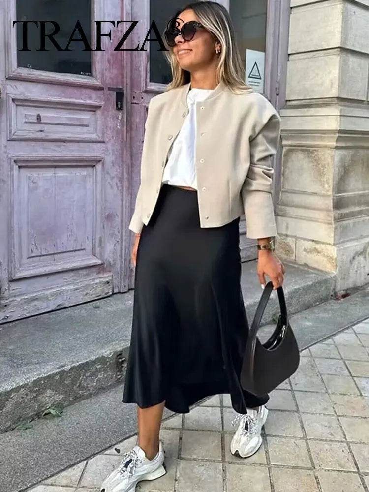 Get ready to elevate your style with our Women's Elastic Waist Mid Length Casual Satin Skirt! Made from high-quality satin, this skirt offers a comfortable and flattering fit with its elastic waistband. Perfect for any casual occasion, it's a must-have addition to your wardrobe.